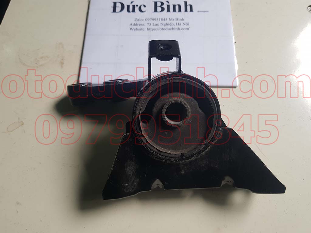 Chân đầu máy Ford Laser 1.6 B25D3906YC