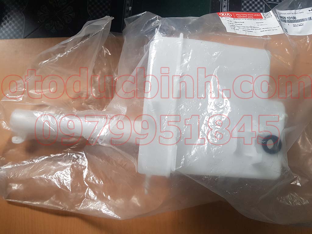 Bình nước rửa kính KIA Carens